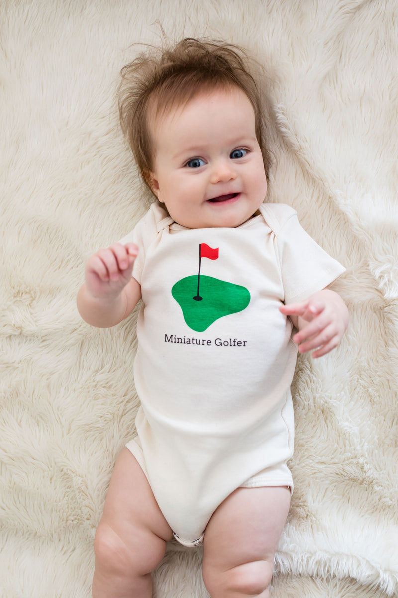 Baby Onesie: Miniature Golfer – Alayne White